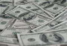 Міжбанк закрився зростанням курсу долара в кінці короткого робочого тижня