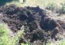 В Харківській області поліція виявила поховання військових Росії. Серед них підполковник