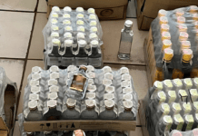 Виготовляли в гаражах, а потім продавали в магазини: у Кривому Розі викрили нелегальне виробництво алкоголю